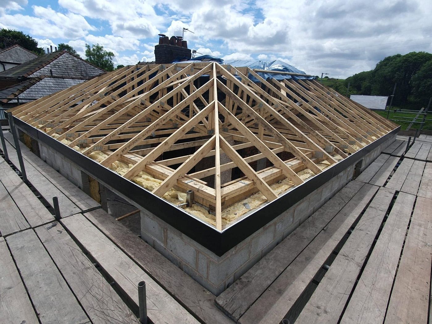 New hip roof timber frame cut and built on site by PJB
